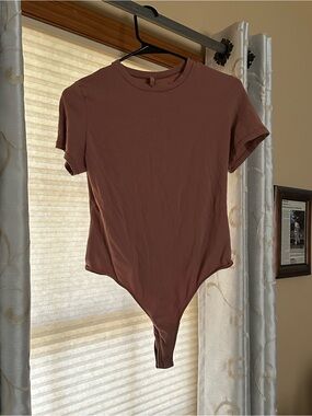 SKIMS Short-Sleeve Bodysuit in Dusty Rose Pink